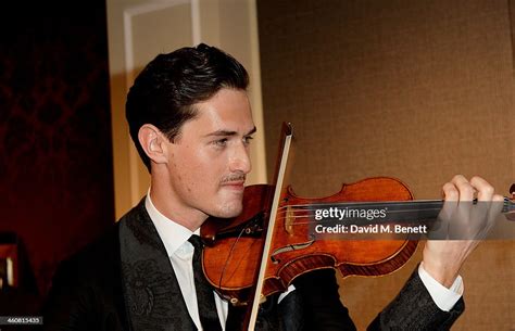 Violinist Charlie Siem performs at the Dolce & Gabbana London